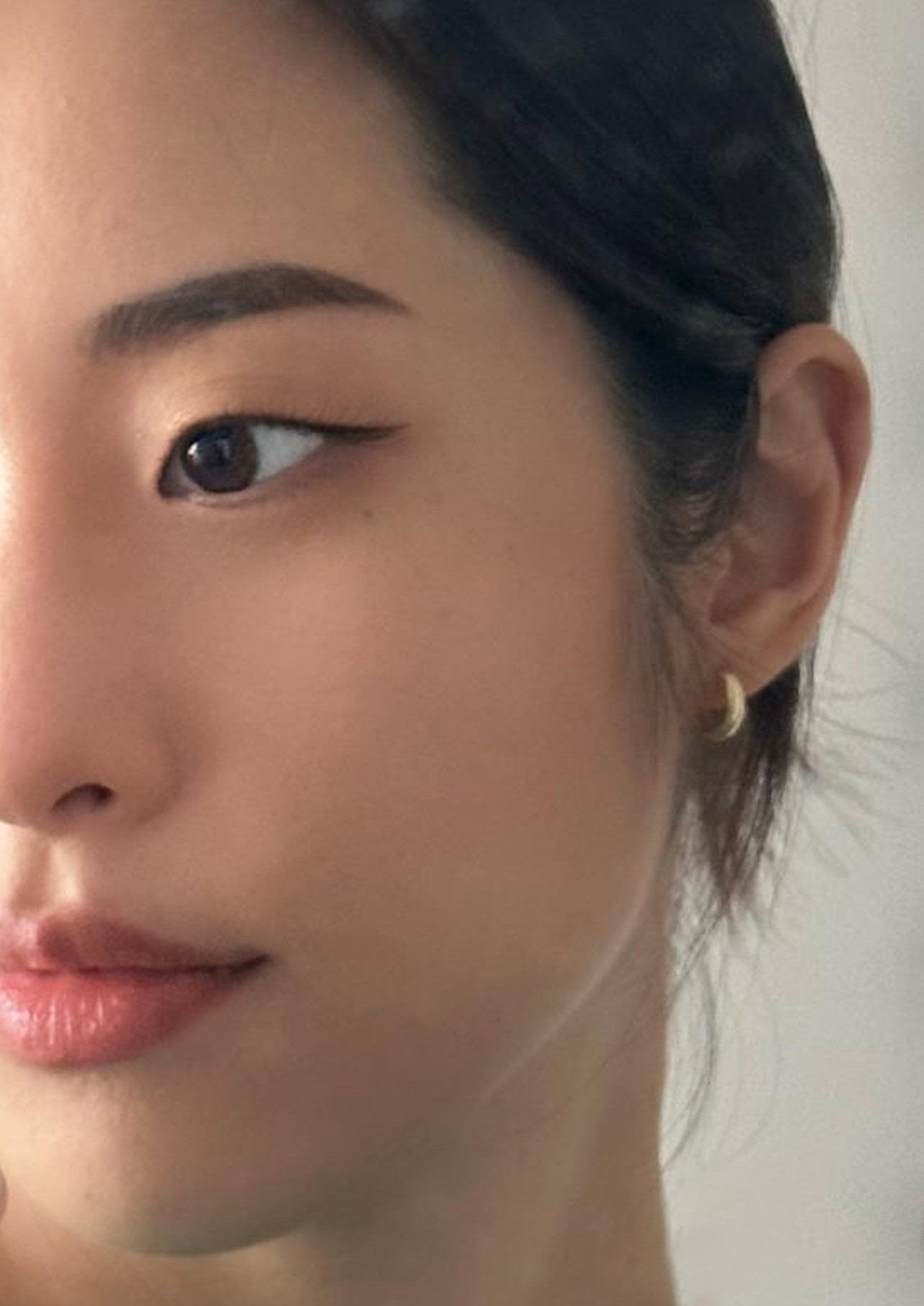closeup of woman left side of face